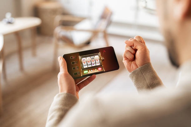 istana77 app showing live football markets and live dealer table options